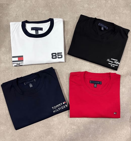 Camisetas Tommy Hilfiger dobradas, peças de atacado JR ONE